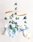 Goose mobile with blue flowers