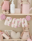 Name banner with pink flowers