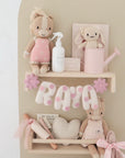 Name banner with pink flowers