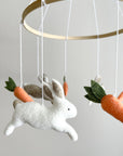 Minimalist bunny mobile with carrots