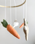 Minimalist bunny mobile with carrots