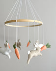Minimalist bunny mobile with carrots