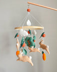 Bunny mobile with orange tree