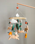 Bunny mobile with orange tree