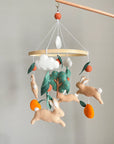 Bunny mobile with orange tree