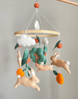 Bunny mobile with orange tree