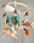 Bunny mobile with orange tree