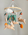 Bunny mobile with orange tree