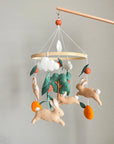 Bunny mobile with orange tree