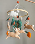 Bunny mobile with orange tree