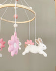 Bunny mobile with pink flowers