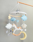 White rocking horse mobile with clouds