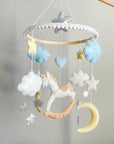White rocking horse mobile with clouds