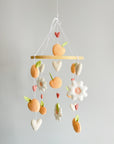 Peach mobile with hearts