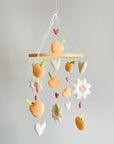 Peach mobile with hearts