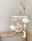 Pink rocking horse mobile with clouds