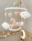 Pink rocking horse mobile with clouds