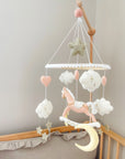 Pink rocking horse mobile with clouds