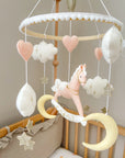 Pink rocking horse mobile with clouds