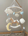 Brown rocking horse mobile with clouds
