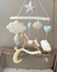 Brown rocking horse mobile with clouds