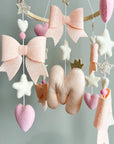 Light pink bow mobile with glitter details