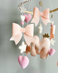Light pink bow mobile with glitter details