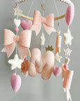Light pink bow mobile with glitter details