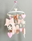 Mobile with light pink bows