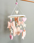 Mobile with light pink bows