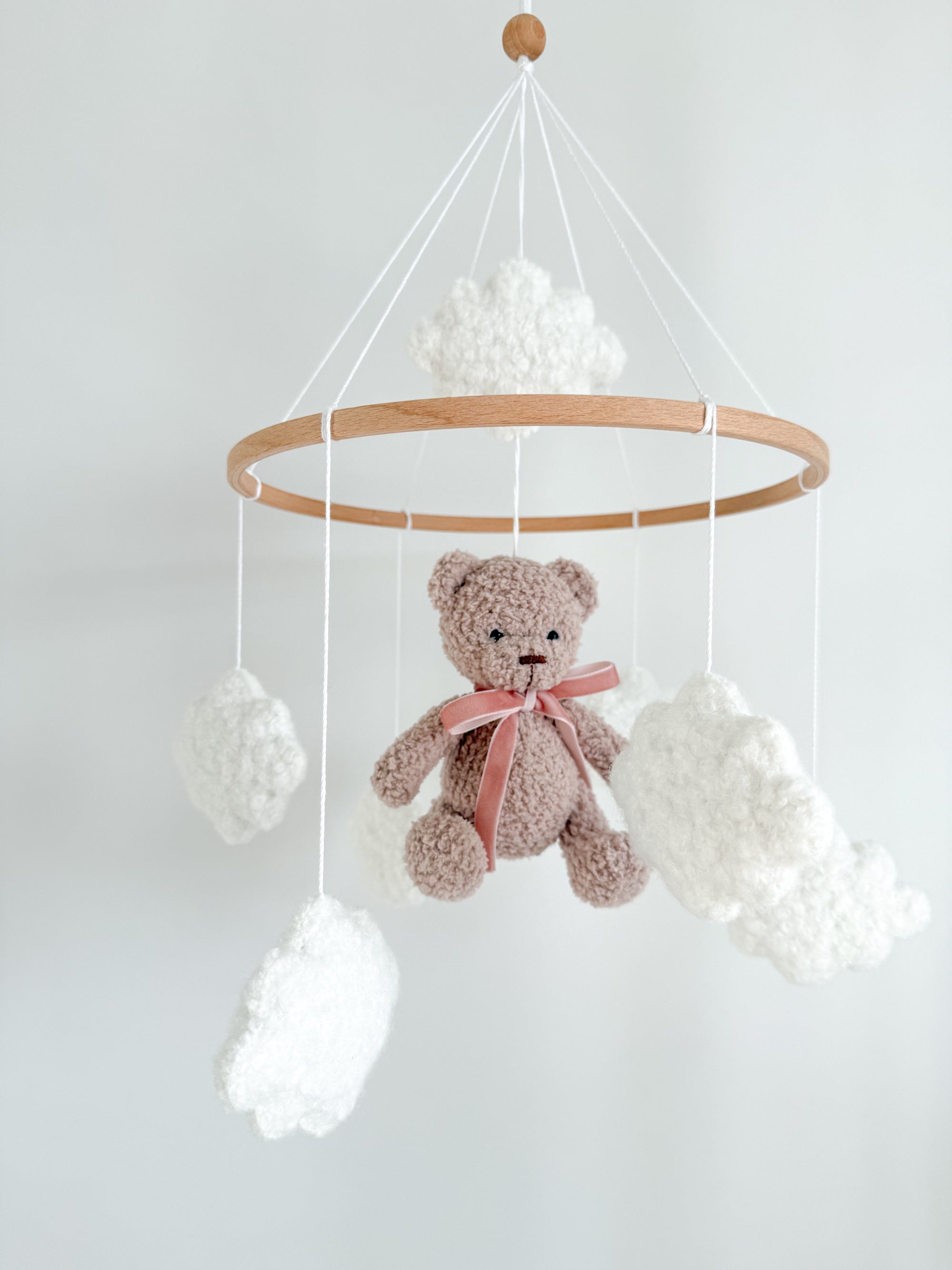 Boucle mobile with beige teddy bear