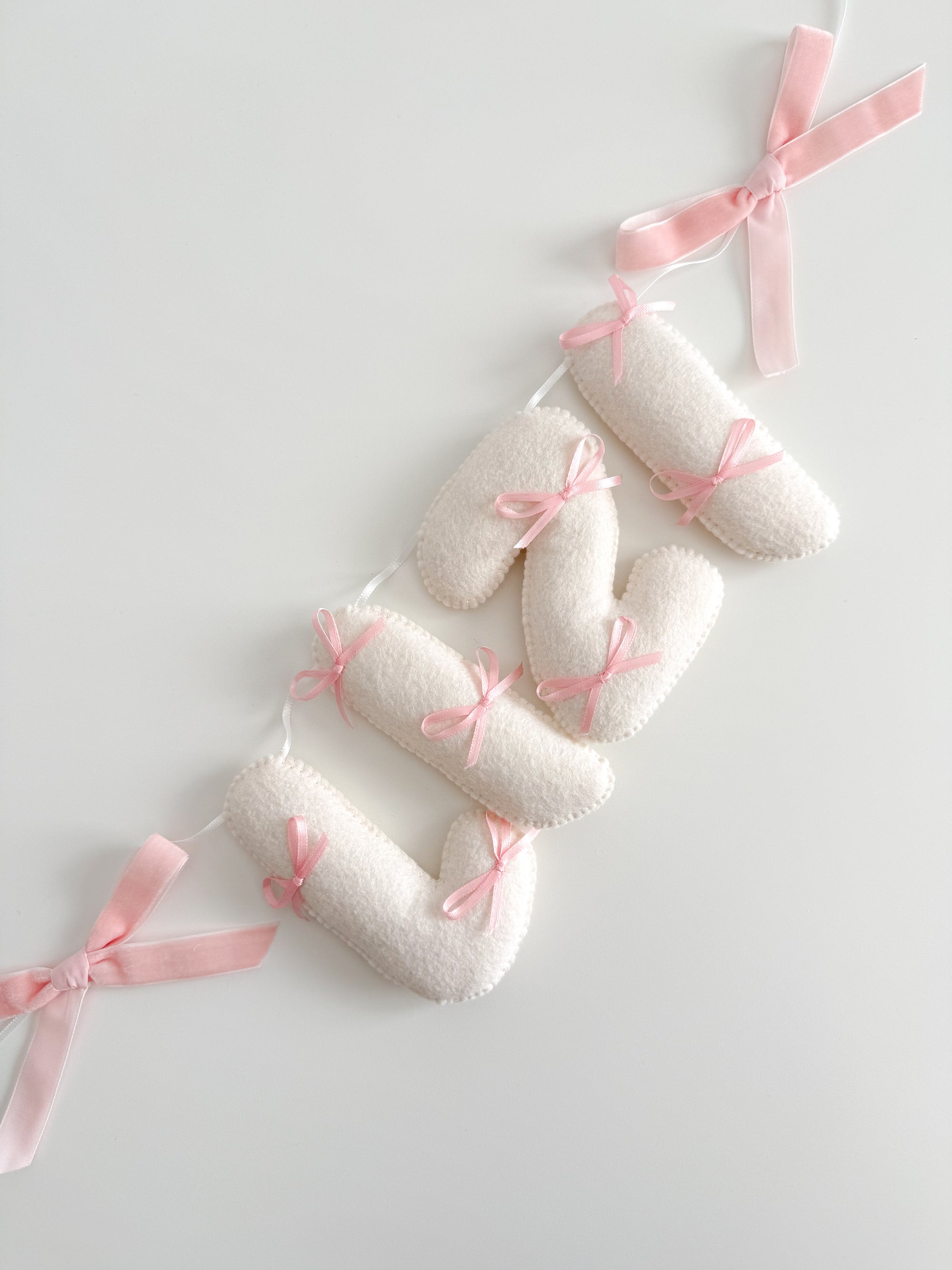 Name banner with small bows