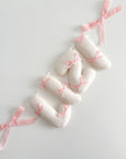 Name banner with small bows