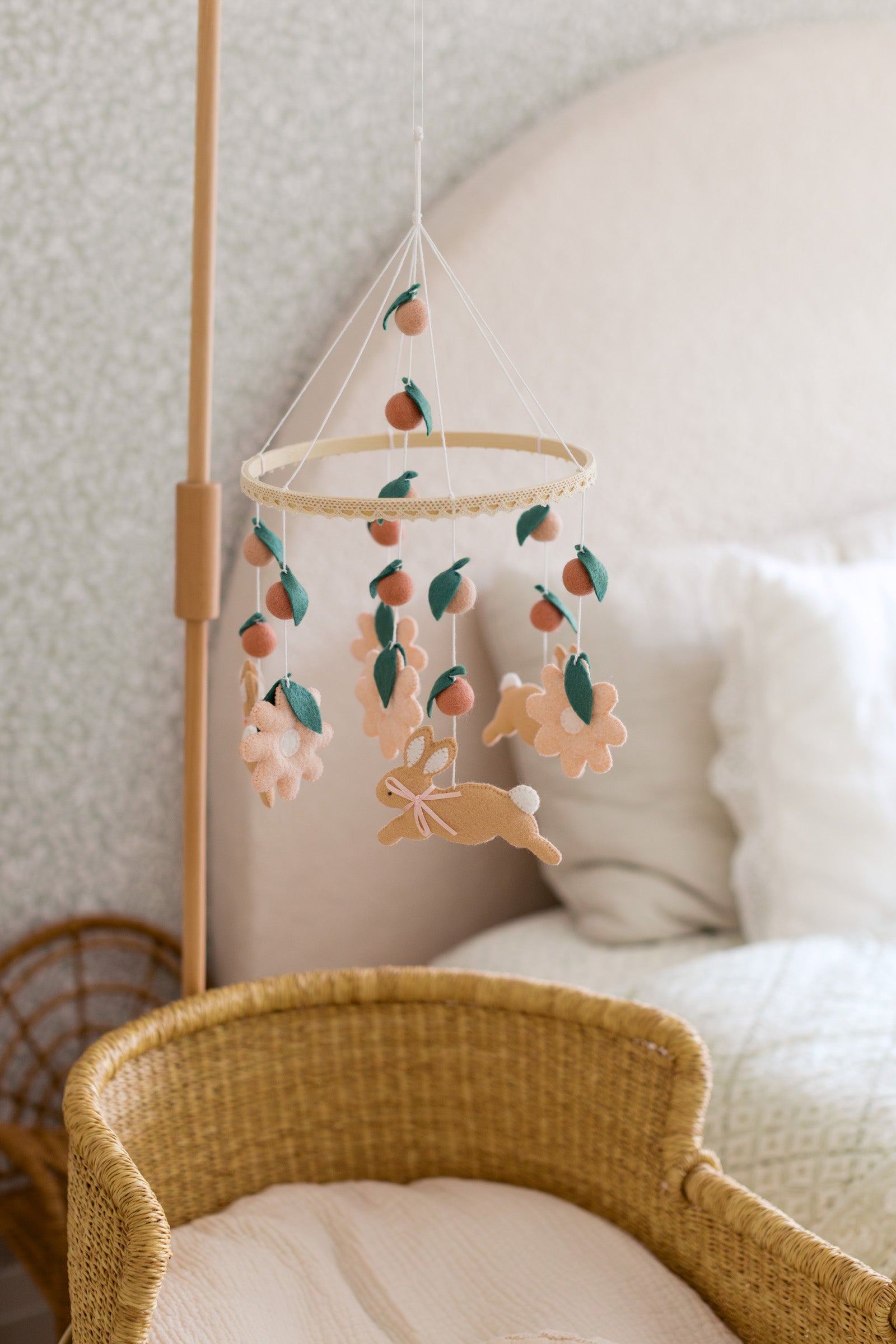 Rabbit mobile with pink flowers