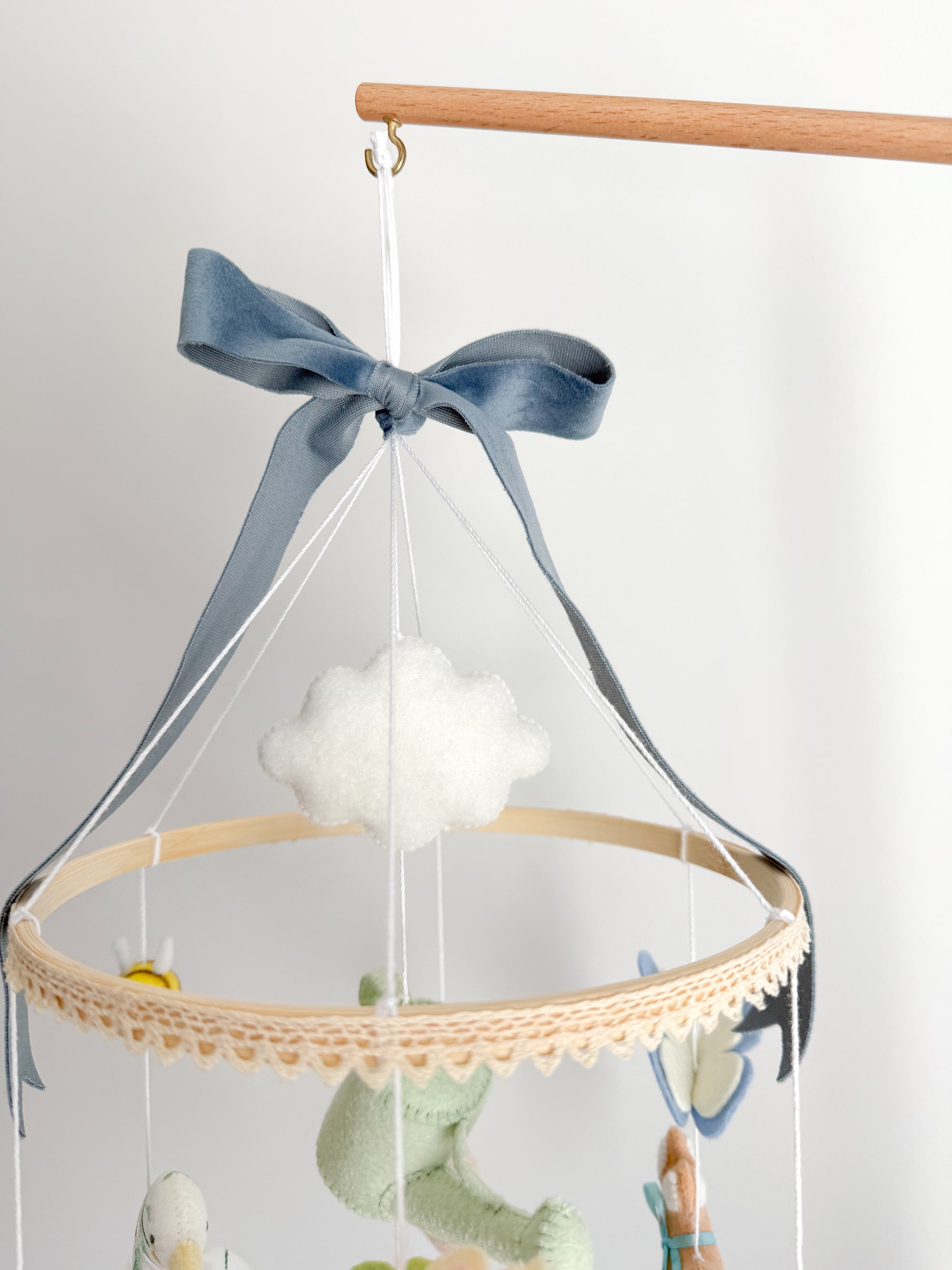 Garden rabbit mobile with blue bow