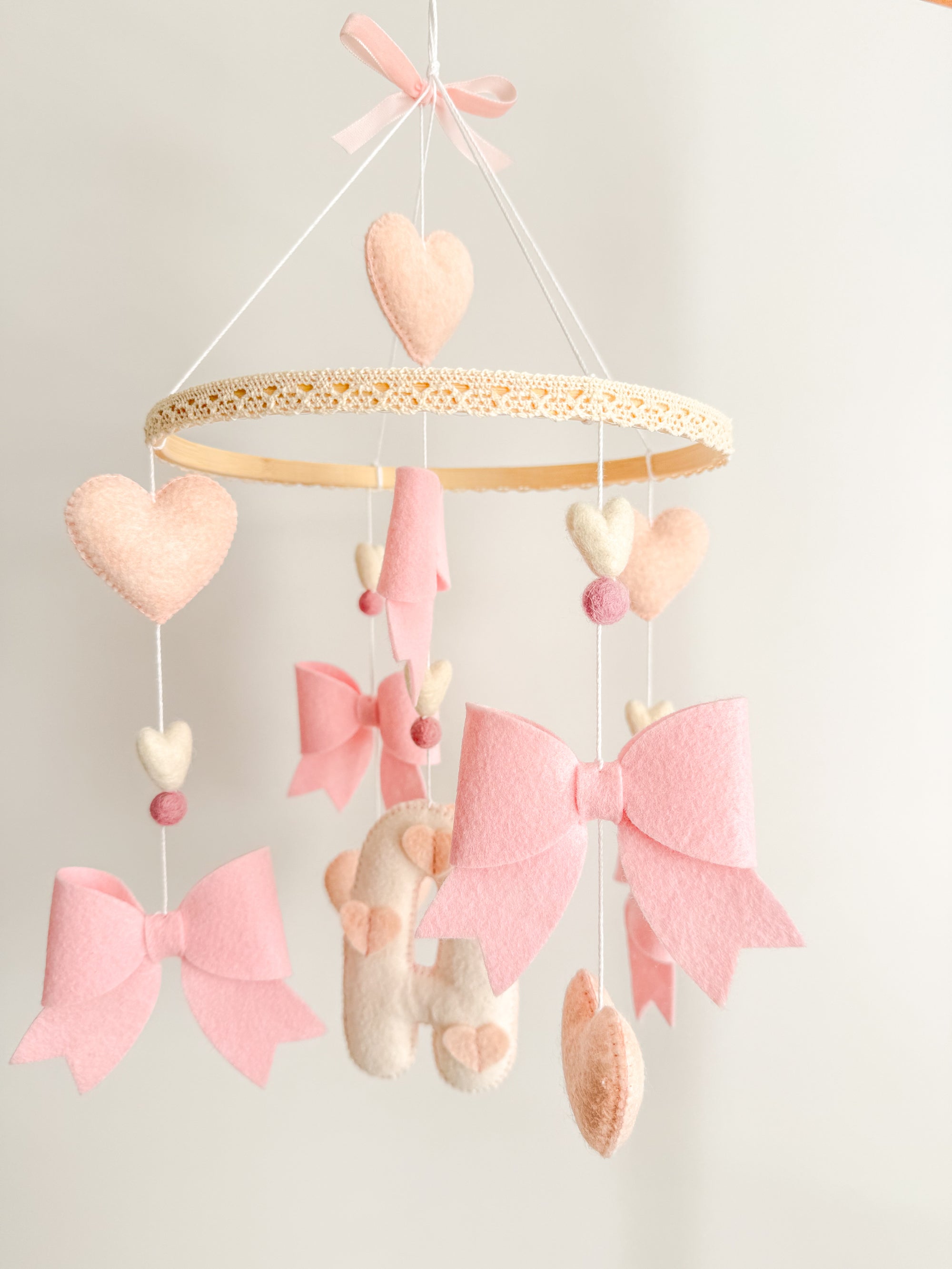 Mobile with bows and hearts