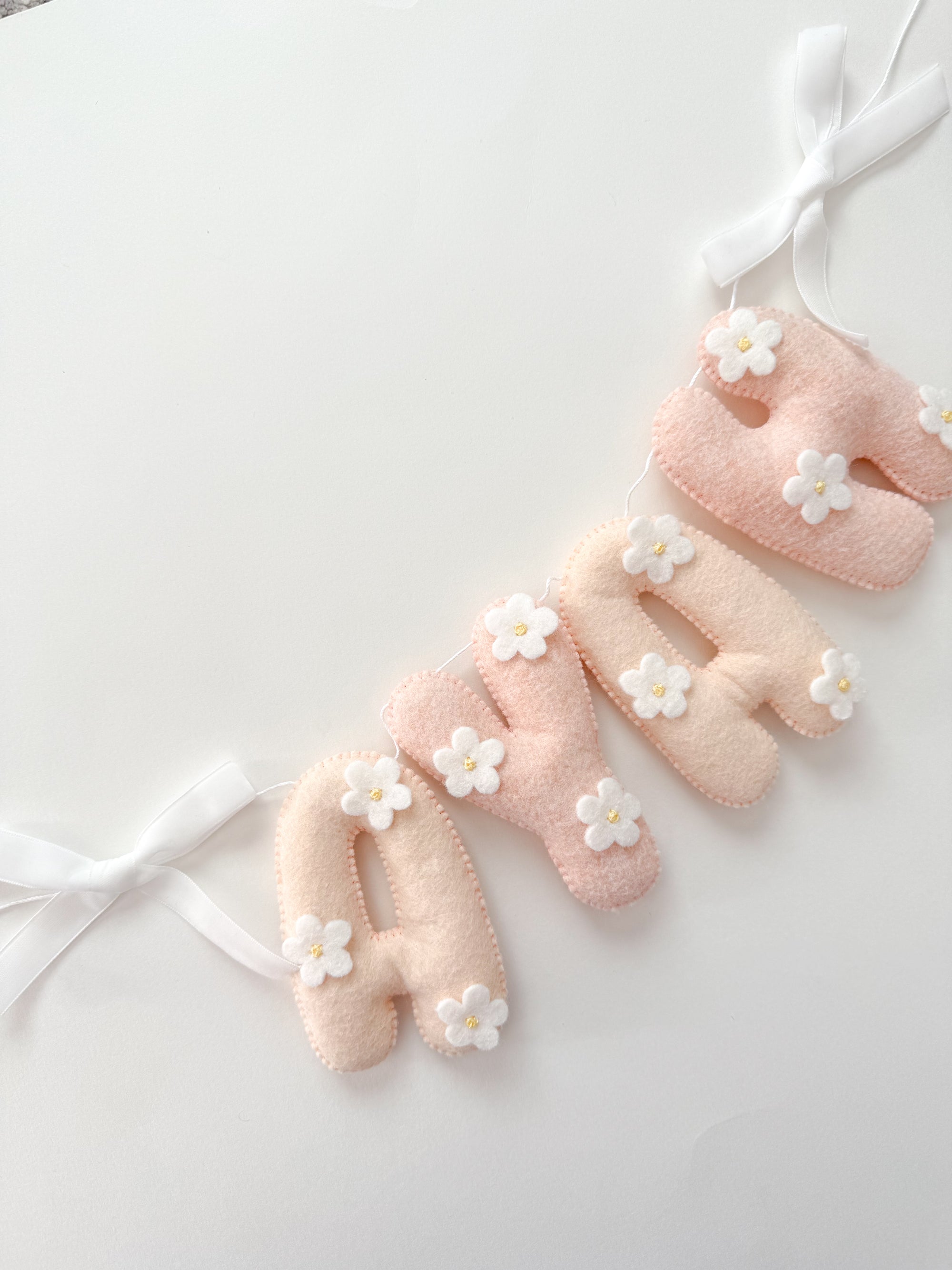 Flower name banner with bows