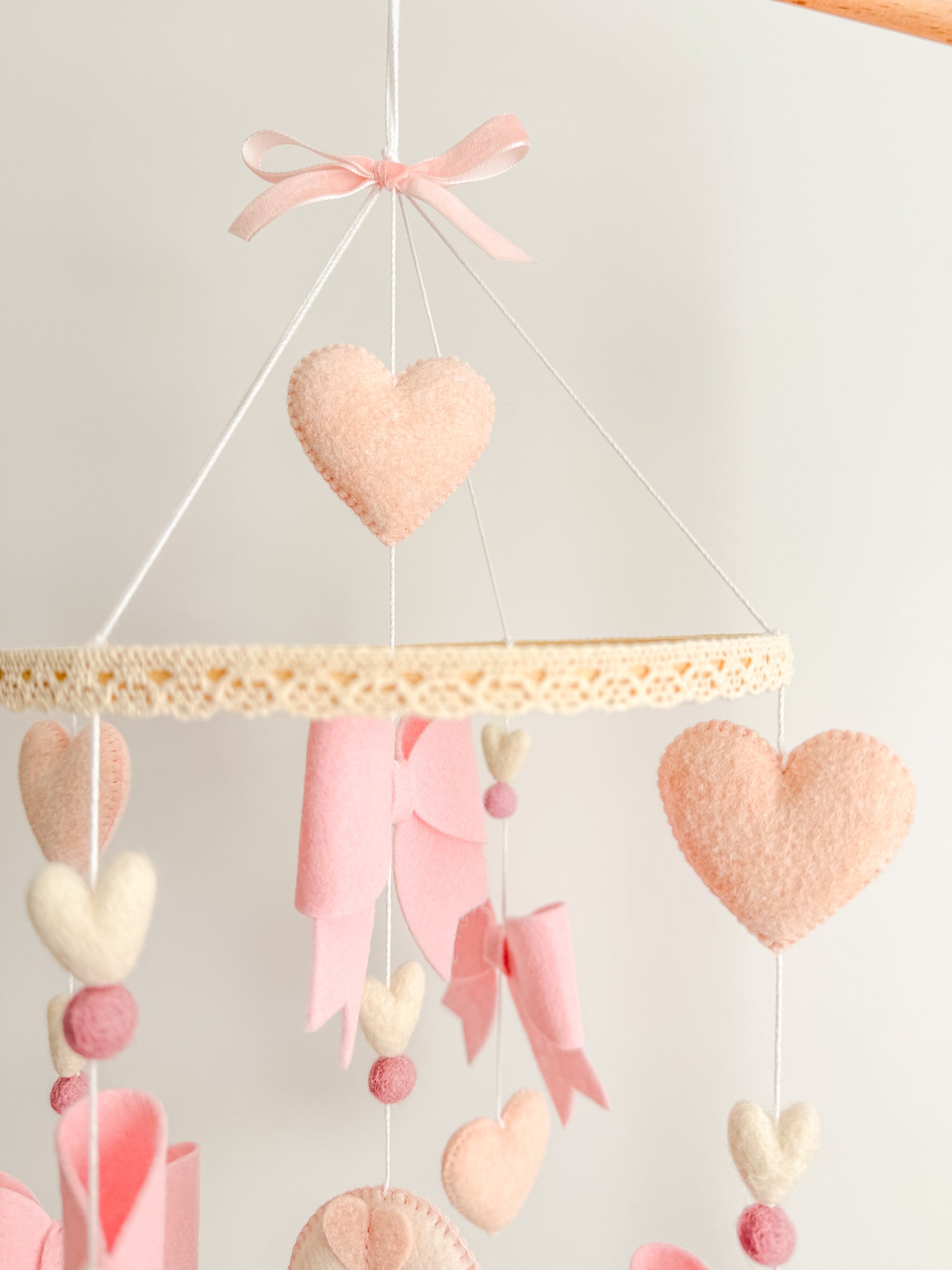 Mobile with bows and hearts