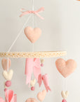 Mobile with bows and hearts