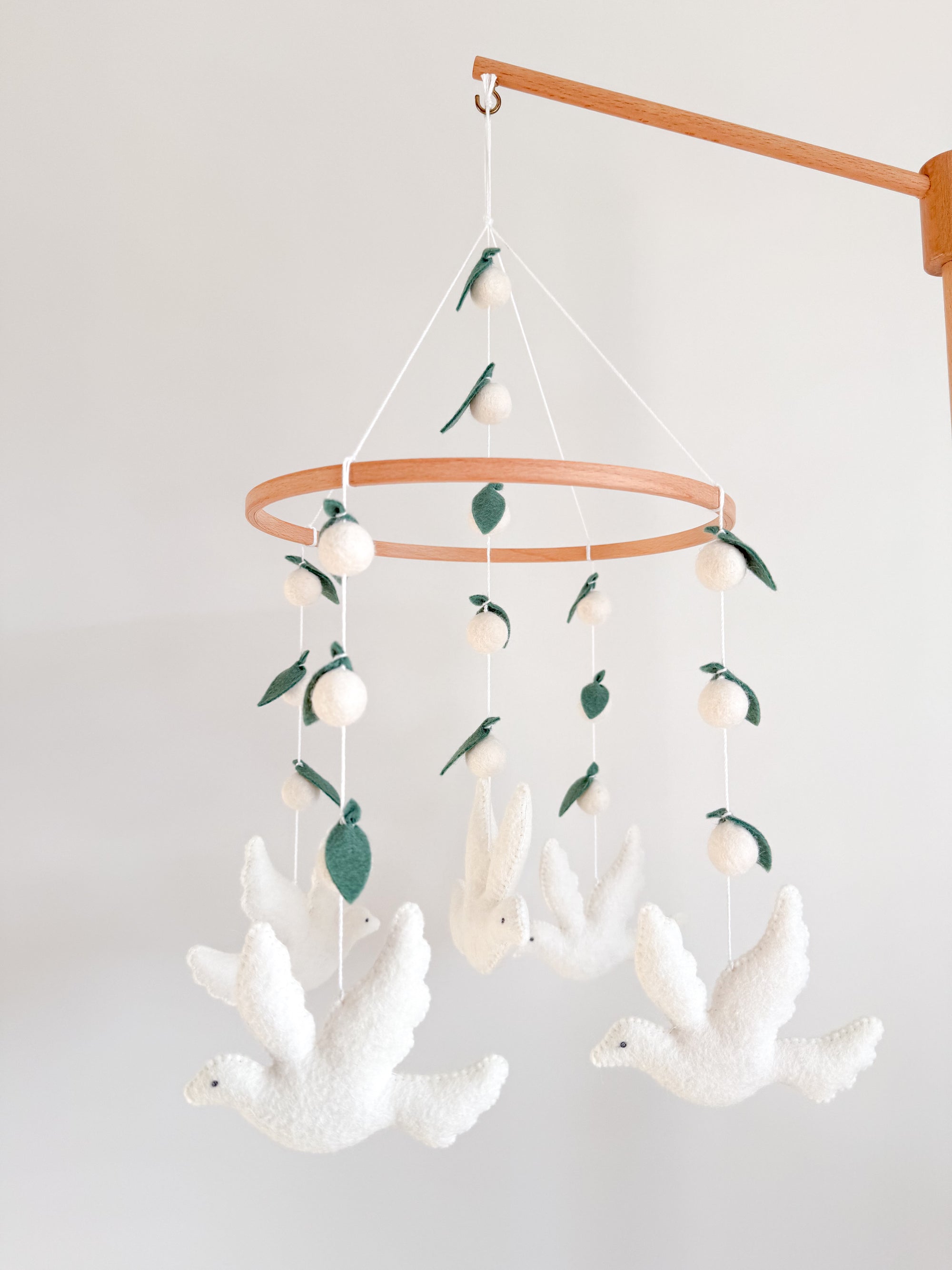 Dove mobile with leaves
