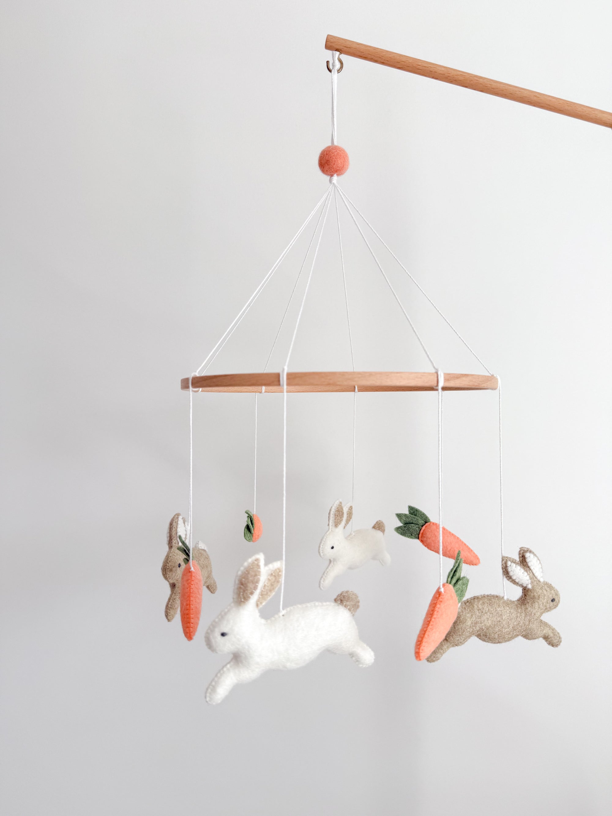 Minimalist bunny mobile with carrots