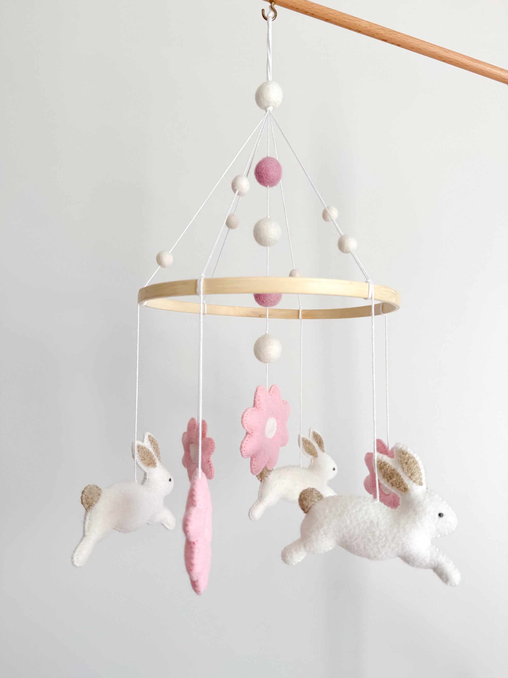 Bunny mobile with pink flowers