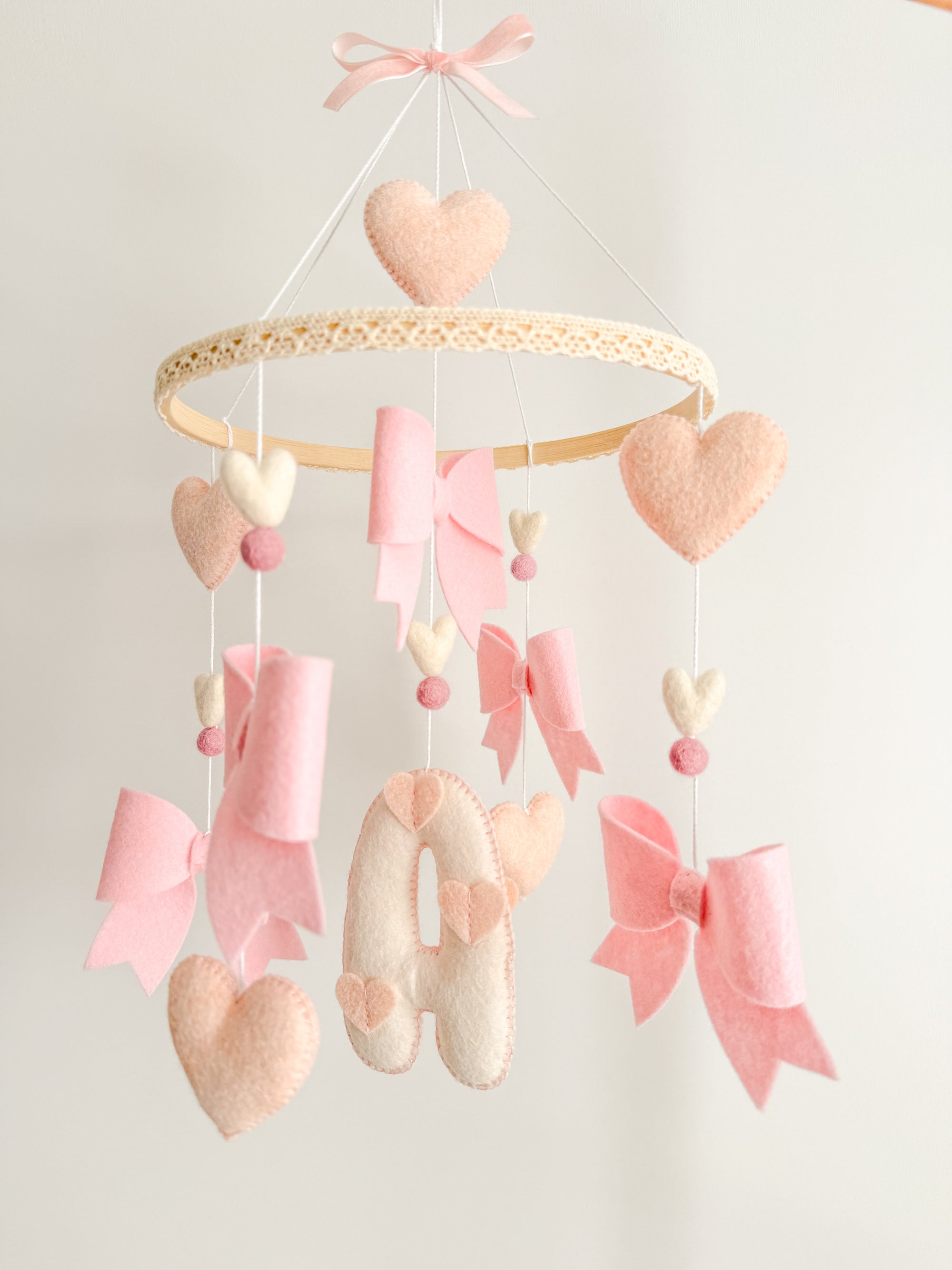 Mobile with bows and hearts