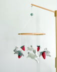 Minimalist bunny mobile with strawberries