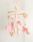 Mobile with bows and hearts