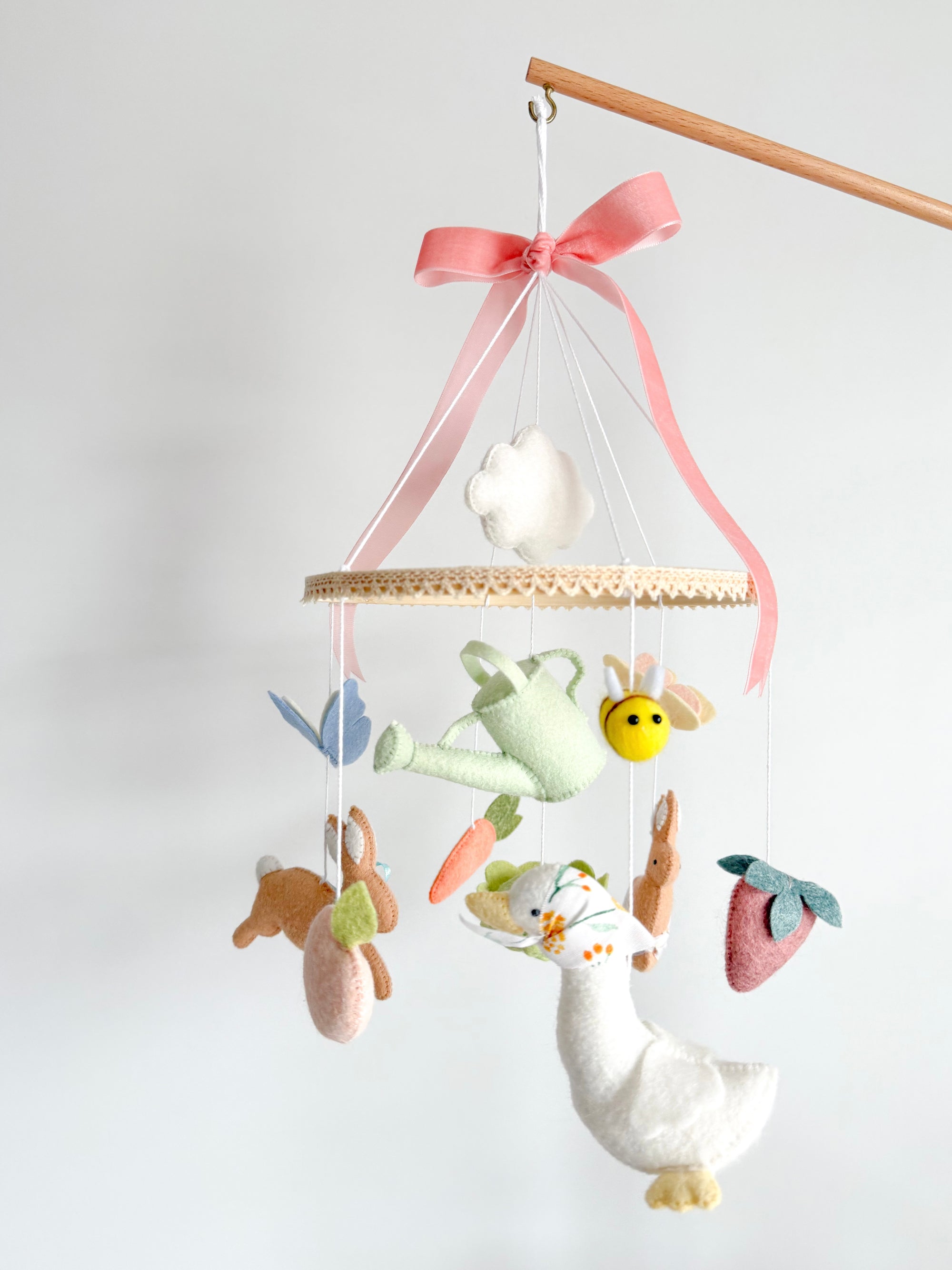 Garden rabbit mobile with pink bow