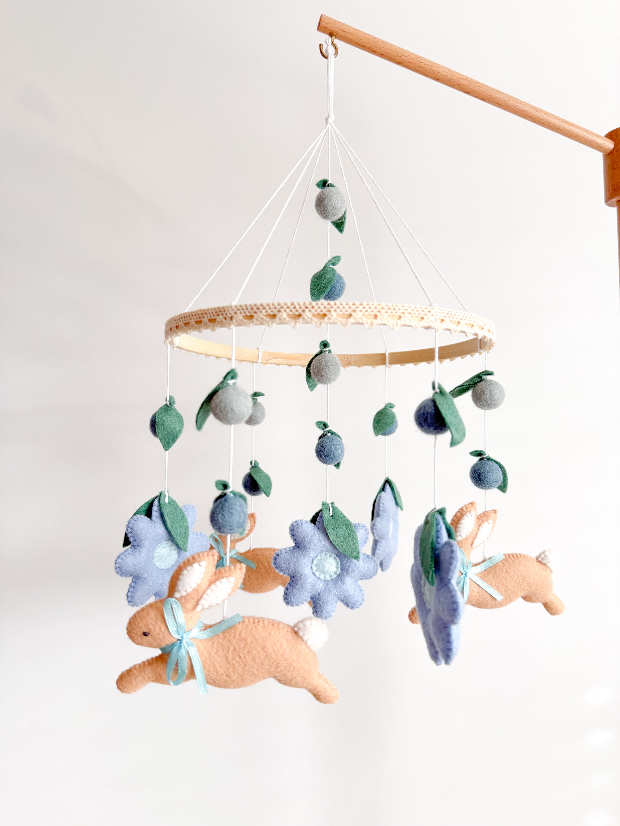Rabbit mobile with blue flowers