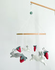 Minimalist bunny mobile with strawberries