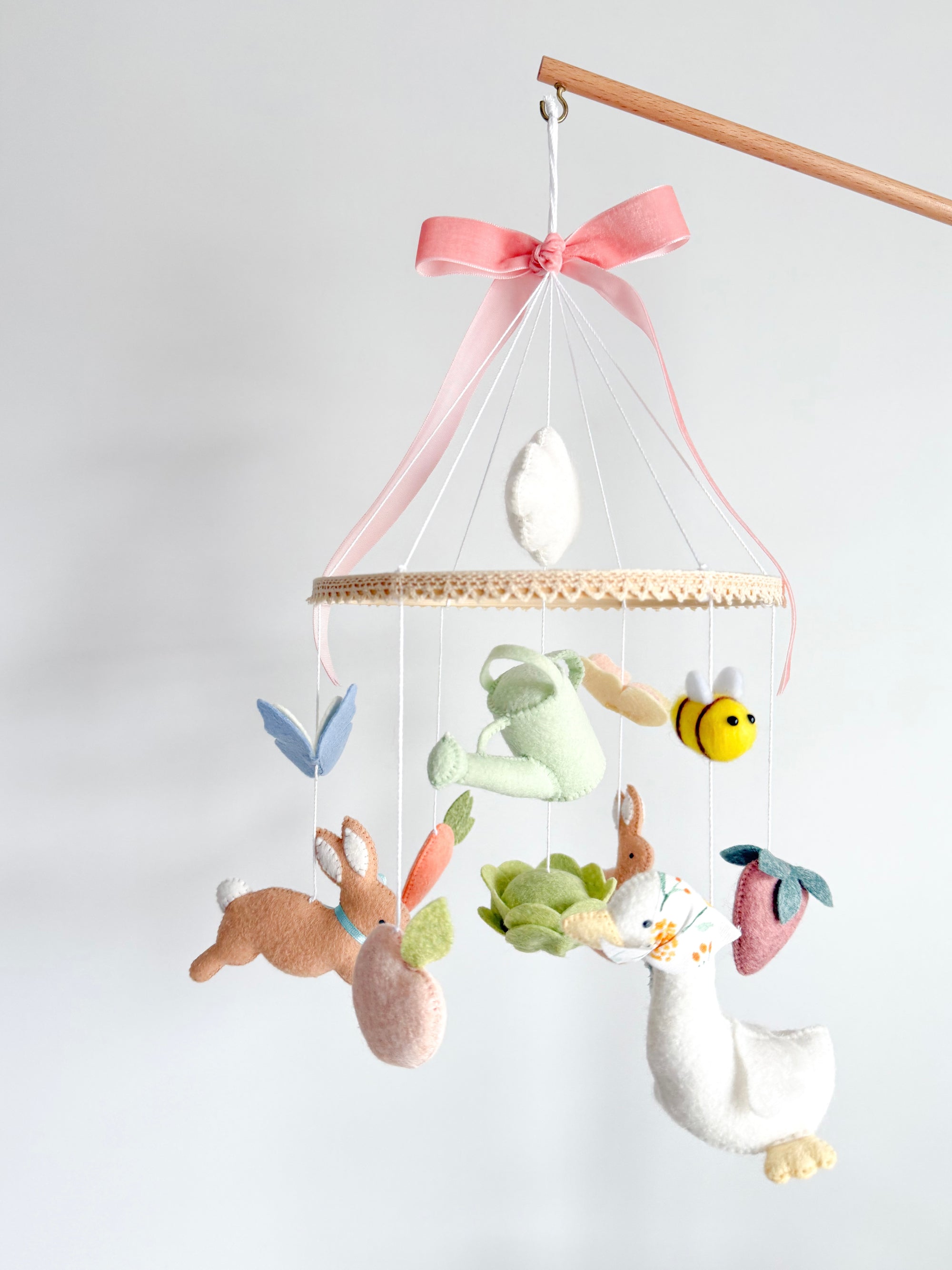 Garden rabbit mobile with pink bow