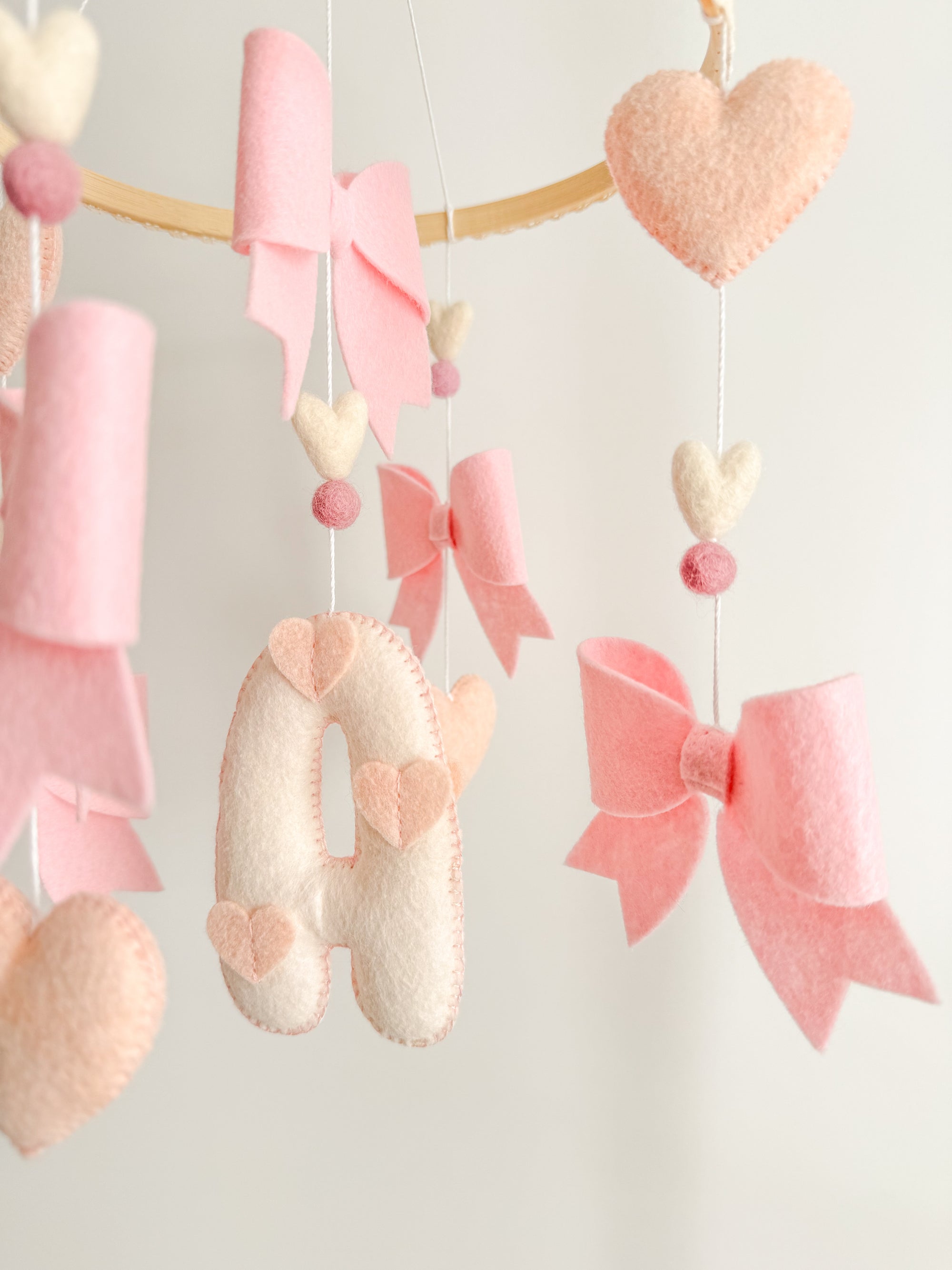 Mobile with bows and hearts